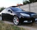 Чорний Опель Інсігнія, об'ємом двигуна 2 л та пробігом 246 тис. км за 5998 $, фото 1 на Automoto.ua