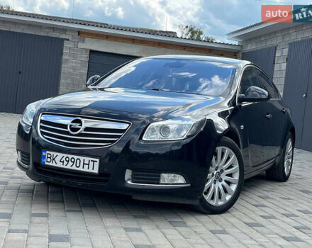 Черный Опель Инсигния, объемом двигателя 2 л и пробегом 320 тыс. км за 7402 $, фото 1 на Automoto.ua