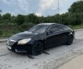 Чорний Опель Інсігнія, об'ємом двигуна 2 л та пробігом 335 тис. км за 5999 $, фото 1 на Automoto.ua