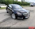 Черный Опель Инсигния, объемом двигателя 2 л и пробегом 218 тыс. км за 7700 $, фото 1 на Automoto.ua