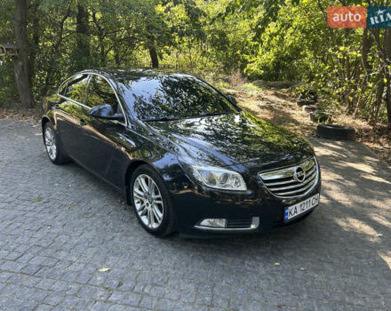 Чорний Опель Інсігнія, об'ємом двигуна 2 л та пробігом 263 тис. км за 7900 $, фото 2 на Automoto.ua