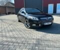 Чорний Опель Інсігнія, об'ємом двигуна 2 л та пробігом 270 тис. км за 6699 $, фото 1 на Automoto.ua