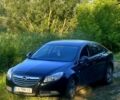 Чорний Опель Інсігнія, об'ємом двигуна 2 л та пробігом 280 тис. км за 5500 $, фото 1 на Automoto.ua