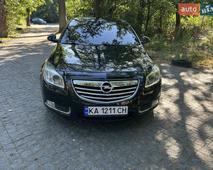 Чорний Опель Інсігнія, об'ємом двигуна 2 л та пробігом 263 тис. км за 7900 $, фото 1 на Automoto.ua