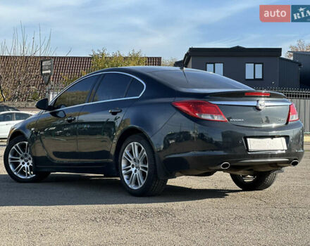 Черный Опель Инсигния, объемом двигателя 2 л и пробегом 263 тыс. км за 8500 $, фото 3 на Automoto.ua