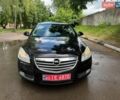 Черный Опель Инсигния, объемом двигателя 1.8 л и пробегом 223 тыс. км за 7950 $, фото 1 на Automoto.ua