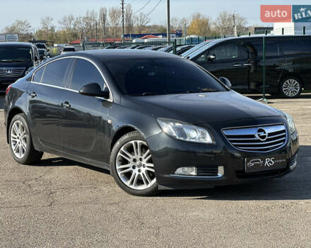 Черный Опель Инсигния, объемом двигателя 2 л и пробегом 263 тыс. км за 8500 $, фото 1 на Automoto.ua