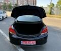 Чорний Опель Інсігнія, об'ємом двигуна 1.8 л та пробігом 223 тис. км за 8044 $, фото 20 на Automoto.ua