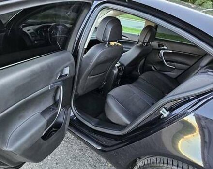 Чорний Опель Інсігнія, об'ємом двигуна 2 л та пробігом 182 тис. км за 7800 $, фото 20 на Automoto.ua