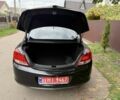 Чорний Опель Інсігнія, об'ємом двигуна 1.8 л та пробігом 192 тис. км за 8000 $, фото 18 на Automoto.ua
