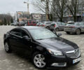 Чорний Опель Інсігнія, об'ємом двигуна 1.96 л та пробігом 188 тис. км за 6950 $, фото 1 на Automoto.ua