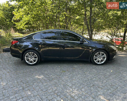 Чорний Опель Інсігнія, об'ємом двигуна 2 л та пробігом 263 тис. км за 7900 $, фото 3 на Automoto.ua