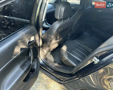 Чорний Опель Інсігнія, об'ємом двигуна 2 л та пробігом 263 тис. км за 7900 $, фото 8 на Automoto.ua