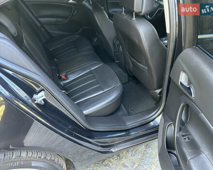 Чорний Опель Інсігнія, об'ємом двигуна 2 л та пробігом 263 тис. км за 7900 $, фото 10 на Automoto.ua