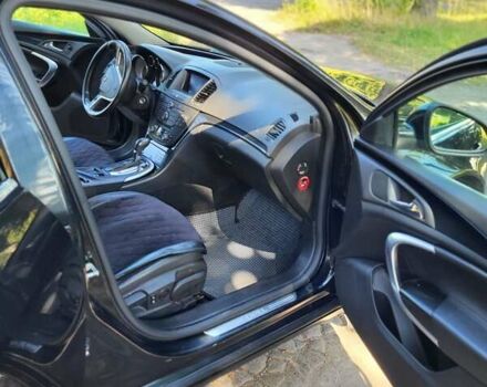 Черный Опель Инсигния, объемом двигателя 2 л и пробегом 240 тыс. км за 9700 $, фото 1 на Automoto.ua