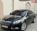Черный Опель Инсигния, объемом двигателя 1.8 л и пробегом 62 тыс. км за 12999 $, фото 1 на Automoto.ua