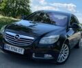 Черный Опель Инсигния, объемом двигателя 2 л и пробегом 220 тыс. км за 6850 $, фото 1 на Automoto.ua