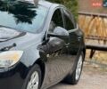 Чорний Опель Інсігнія, об'ємом двигуна 2 л та пробігом 297 тис. км за 7000 $, фото 1 на Automoto.ua