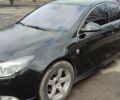 Чорний Опель Інсігнія, об'ємом двигуна 2 л та пробігом 152 тис. км за 9700 $, фото 1 на Automoto.ua