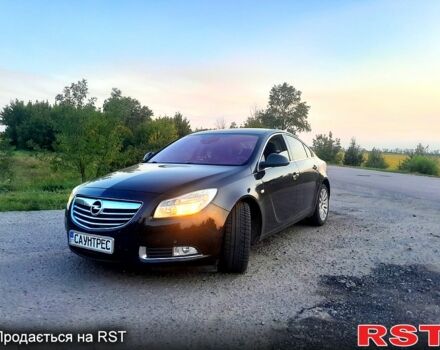 Черный Опель Инсигния, объемом двигателя 2 л и пробегом 265 тыс. км за 8000 $, фото 1 на Automoto.ua