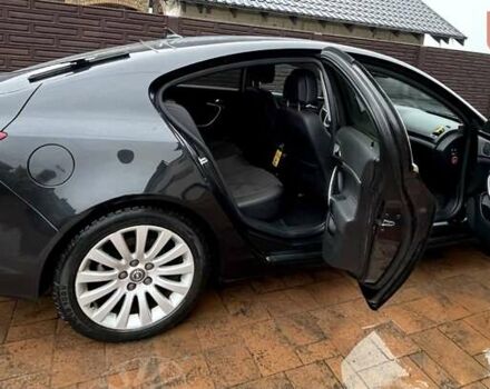 Черный Опель Инсигния, объемом двигателя 1.96 л и пробегом 217 тыс. км за 7777 $, фото 5 на Automoto.ua