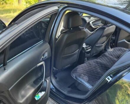 Черный Опель Инсигния, объемом двигателя 2 л и пробегом 240 тыс. км за 9700 $, фото 2 на Automoto.ua