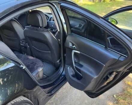 Черный Опель Инсигния, объемом двигателя 2 л и пробегом 240 тыс. км за 9700 $, фото 6 на Automoto.ua