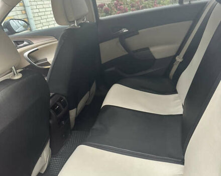 Чорний Опель Інсігнія, об'ємом двигуна 1.96 л та пробігом 253 тис. км за 8500 $, фото 7 на Automoto.ua