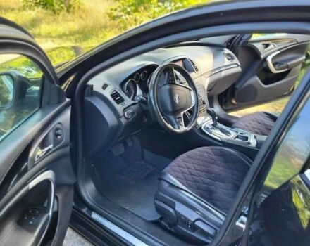 Черный Опель Инсигния, объемом двигателя 2 л и пробегом 240 тыс. км за 9700 $, фото 3 на Automoto.ua