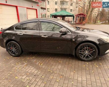 Черный Опель Инсигния, объемом двигателя 2 л и пробегом 209 тыс. км за 8200 $, фото 6 на Automoto.ua