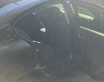 Черный Опель Инсигния, объемом двигателя 1.8 л и пробегом 294 тыс. км за 7500 $, фото 3 на Automoto.ua