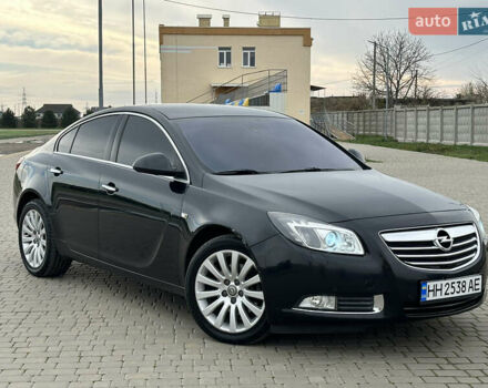 Черный Опель Инсигния, объемом двигателя 2 л и пробегом 310 тыс. км за 7700 $, фото 1 на Automoto.ua