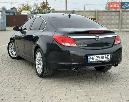 Черный Опель Инсигния, объемом двигателя 2 л и пробегом 310 тыс. км за 7700 $, фото 5 на Automoto.ua