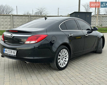 Черный Опель Инсигния, объемом двигателя 2 л и пробегом 310 тыс. км за 7700 $, фото 3 на Automoto.ua
