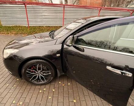 Черный Опель Инсигния, объемом двигателя 2 л и пробегом 209 тыс. км за 8200 $, фото 7 на Automoto.ua