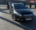 Черный Опель Инсигния, объемом двигателя 2 л и пробегом 330 тыс. км за 7800 $, фото 1 на Automoto.ua