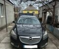 Черный Опель Инсигния, объемом двигателя 2 л и пробегом 255 тыс. км за 6700 $, фото 1 на Automoto.ua