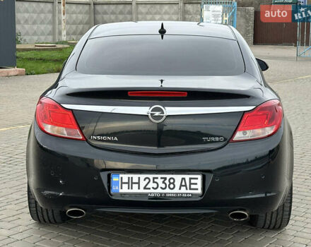 Черный Опель Инсигния, объемом двигателя 2 л и пробегом 310 тыс. км за 7700 $, фото 4 на Automoto.ua
