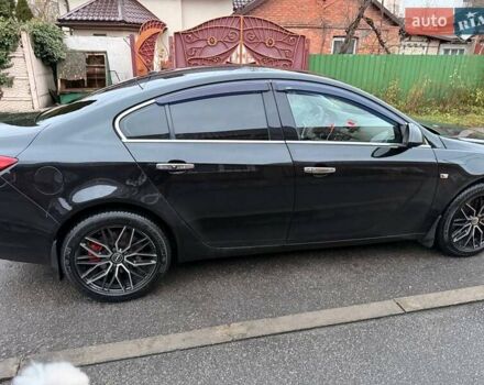 Черный Опель Инсигния, объемом двигателя 2 л и пробегом 209 тыс. км за 8200 $, фото 2 на Automoto.ua