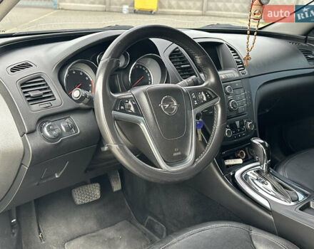 Черный Опель Инсигния, объемом двигателя 2 л и пробегом 310 тыс. км за 7700 $, фото 6 на Automoto.ua