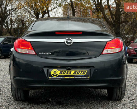 Чорний Опель Інсігнія, об'ємом двигуна 1.36 л та пробігом 161 тис. км за 8750 $, фото 4 на Automoto.ua