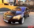 Черный Опель Инсигния, объемом двигателя 2 л и пробегом 217 тыс. км за 8500 $, фото 1 на Automoto.ua