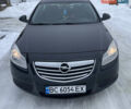 Черный Опель Инсигния, объемом двигателя 1.96 л и пробегом 344 тыс. км за 7500 $, фото 1 на Automoto.ua