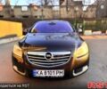 Черный Опель Инсигния, объемом двигателя 2 л и пробегом 217 тыс. км за 8500 $, фото 1 на Automoto.ua