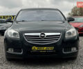 Чорний Опель Інсігнія, об'ємом двигуна 1.36 л та пробігом 161 тис. км за 8750 $, фото 1 на Automoto.ua