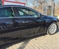 Чорний Опель Інсігнія, об'ємом двигуна 2 л та пробігом 227 тис. км за 8000 $, фото 7 на Automoto.ua