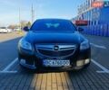 Черный Опель Инсигния, объемом двигателя 2 л и пробегом 253 тыс. км за 10400 $, фото 1 на Automoto.ua