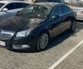 Чорний Опель Інсігнія, об'ємом двигуна 2 л та пробігом 240 тис. км за 7700 $, фото 1 на Automoto.ua