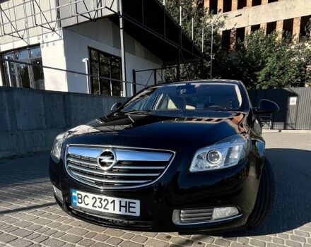Черный Опель Инсигния, объемом двигателя 2 л и пробегом 304 тыс. км за 7500 $, фото 3 на Automoto.ua