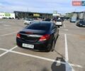 Чорний Опель Інсігнія, об'ємом двигуна 1.96 л та пробігом 180 тис. км за 8950 $, фото 6 на Automoto.ua